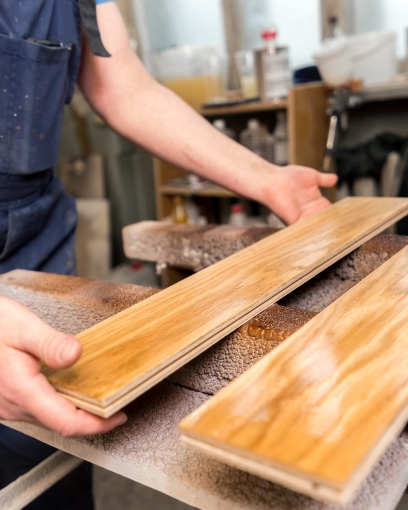 manual-production-of-parquet-boards-wood-flooring-factory-.jpg